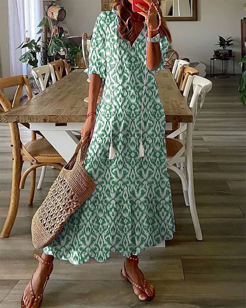 Ameline – Maxi Šaty s Rozšířeným Střihem a Elegantním V-Výstřihem