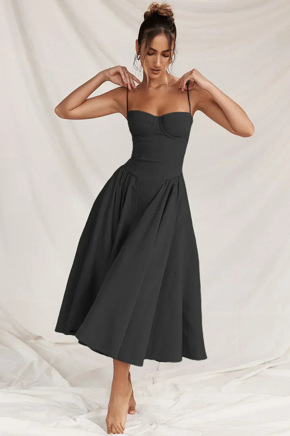 Jutte - Dámské bezrukávové midikleid